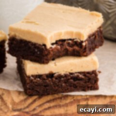 Irresistible Peanut Butter Fudge Brownies 12 two brownies, one with a bite out of it