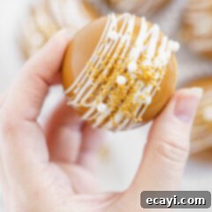 Melting Caramel Cocoa Delights 17 woman holding a caramel hot cocoa bomb