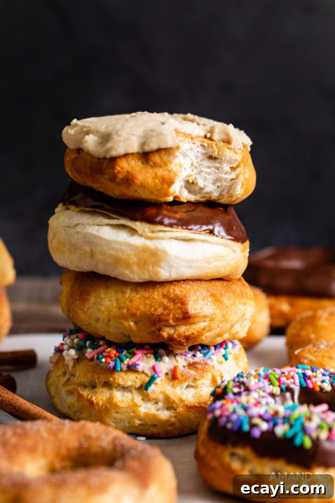 Air Fryer Donut Delights 3 A charming stack of decorated air fryer donuts, highlighting their fluffy texture and delicious toppings.