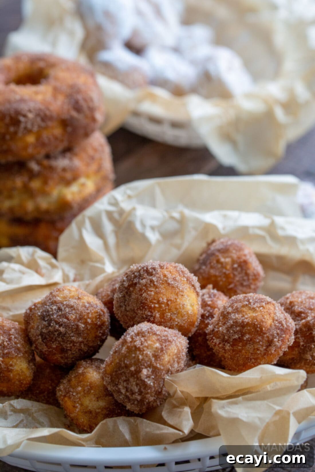 Air Fryer Donut Delights 9 A close-up of fluffy air fryer donut holes, coated in a sweet glaze, ready for a delicious bite.