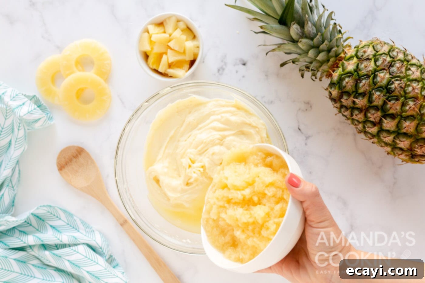 Golden Pineapple Yogurt Cloud 6 adding crushed pineapple to bowl with yogurt and pudding mix