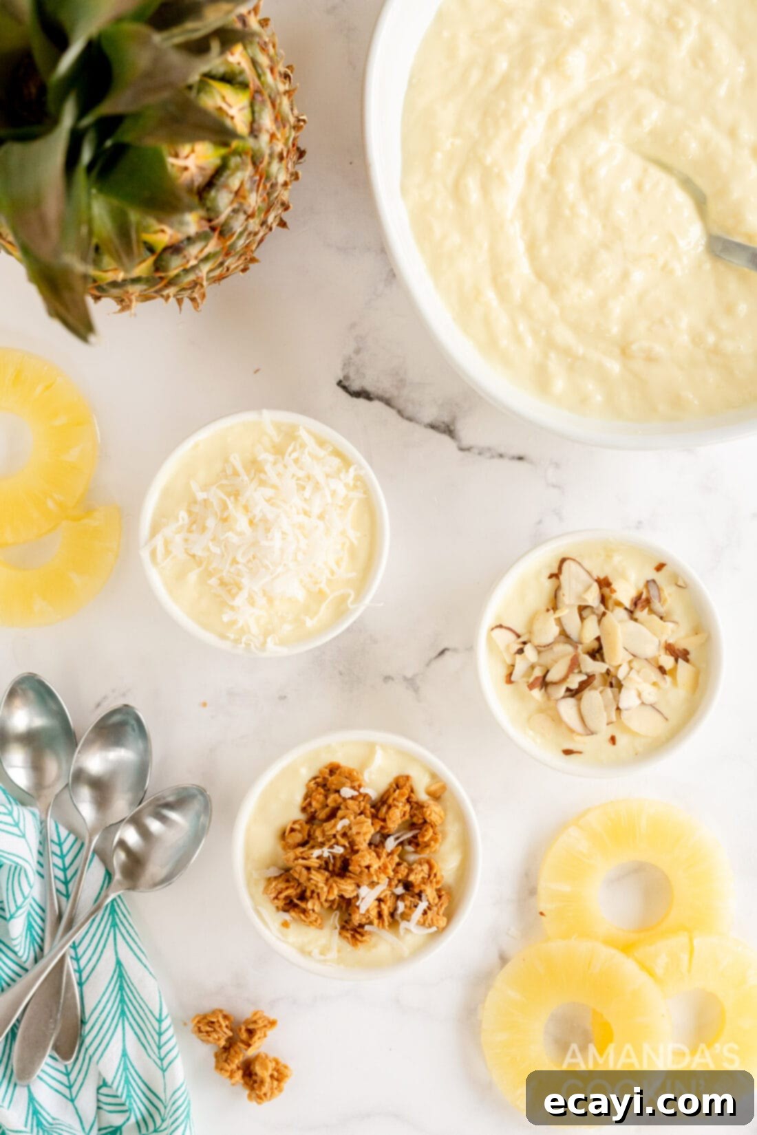Golden Pineapple Yogurt Cloud 8 overhead photo of pineapple yogurt dessert in various ramekins with toppings