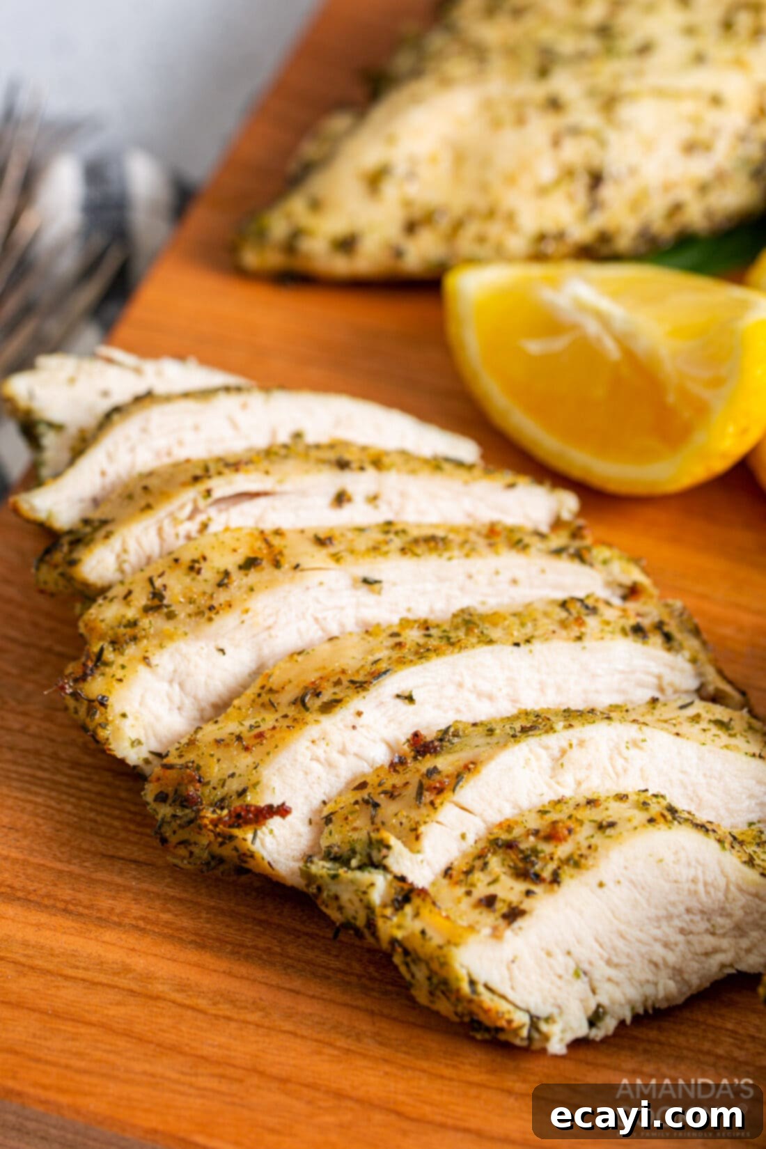 Perfect Air Fryer Chicken Breasts 3 Perfectly sliced, juicy air fried chicken breasts revealing tender white meat, ready for serving.