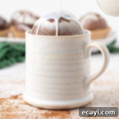 Swirled Mocha Cocoa Melts 7 pouring milk over a hot cocoa bomb