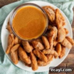 Crispy Cinnamon Air Fryer Apple Fries 6 plate of air fryer apple fries with caramel sauce