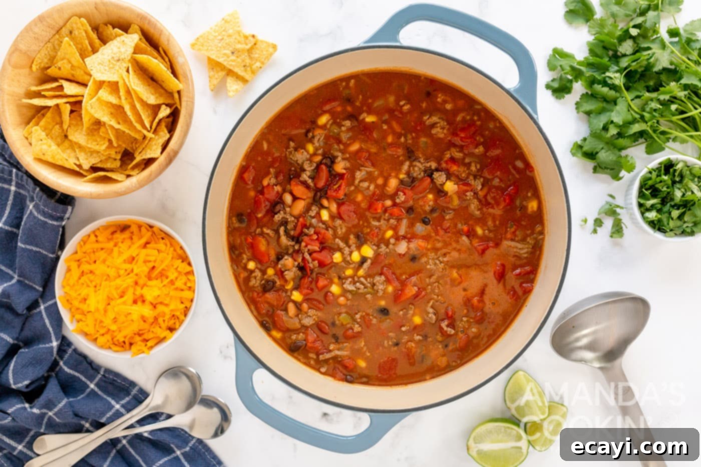 Fiesta Taco Soup 8 The taco soup simmering gently in a large pot, with all ingredients combined and flavors melding.