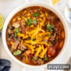 Fiesta Taco Soup 10 A vibrant bowl of homemade taco soup, garnished with fresh cilantro and a lime wedge.
