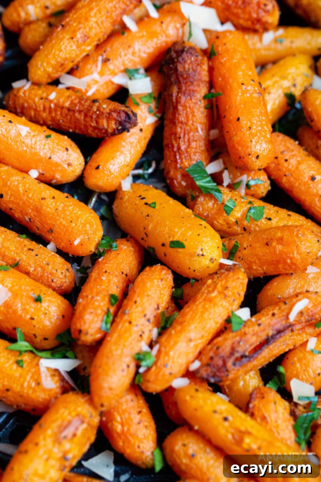 Golden Air Fryer Carrots 2 Perfectly cooked, tender-crisp carrots in an air fryer basket, ready to be served as a healthy side dish.