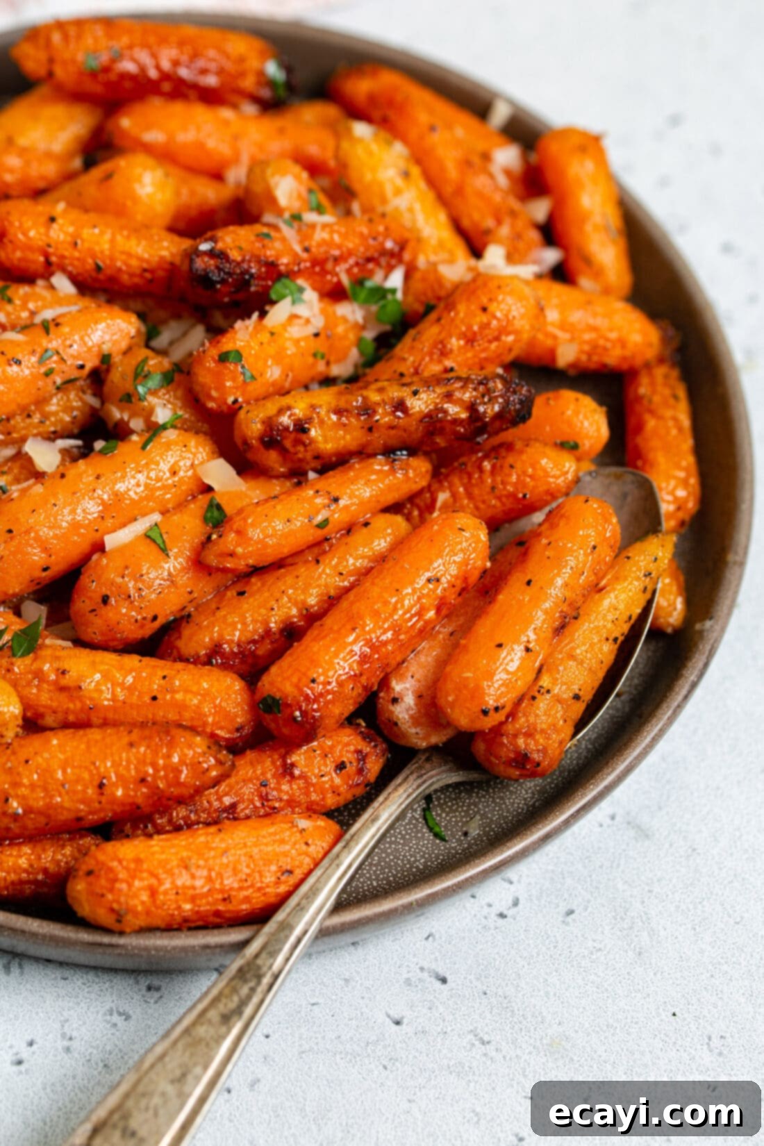 Golden Air Fryer Carrots 8 A beautifully arranged plate of air fryer carrots, garnished and ready to be enjoyed as a perfect healthy side dish.