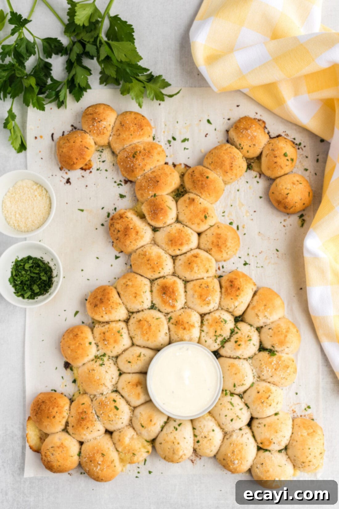 Easter Bunny Tear and Share Bread 2 A festive Easter bunny pull apart bread, shaped like a rabbit, ready to be served as an appetizer on a rustic table.