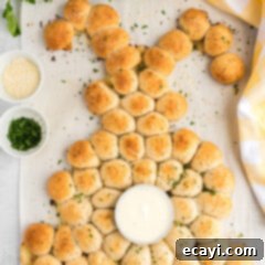 Easter Bunny Tear and Share Bread 11 A beautifully baked Easter bunny pull apart bread, shaped like a rabbit with a ramekin for dipping sauce, ready for serving.
