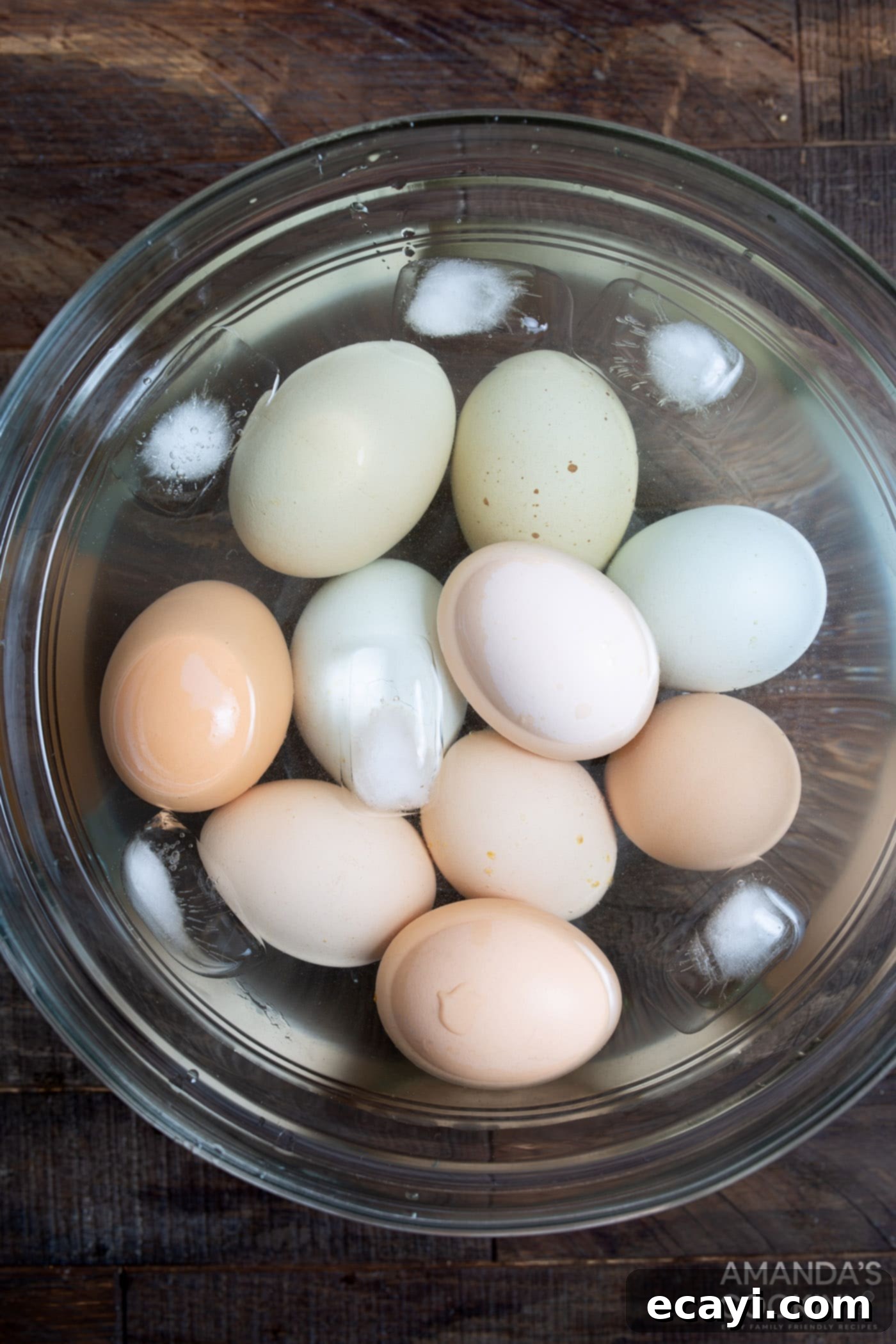 Hard Boiled Eggs in the Air Fryer 5 Cooked eggs submerged in an ice bath