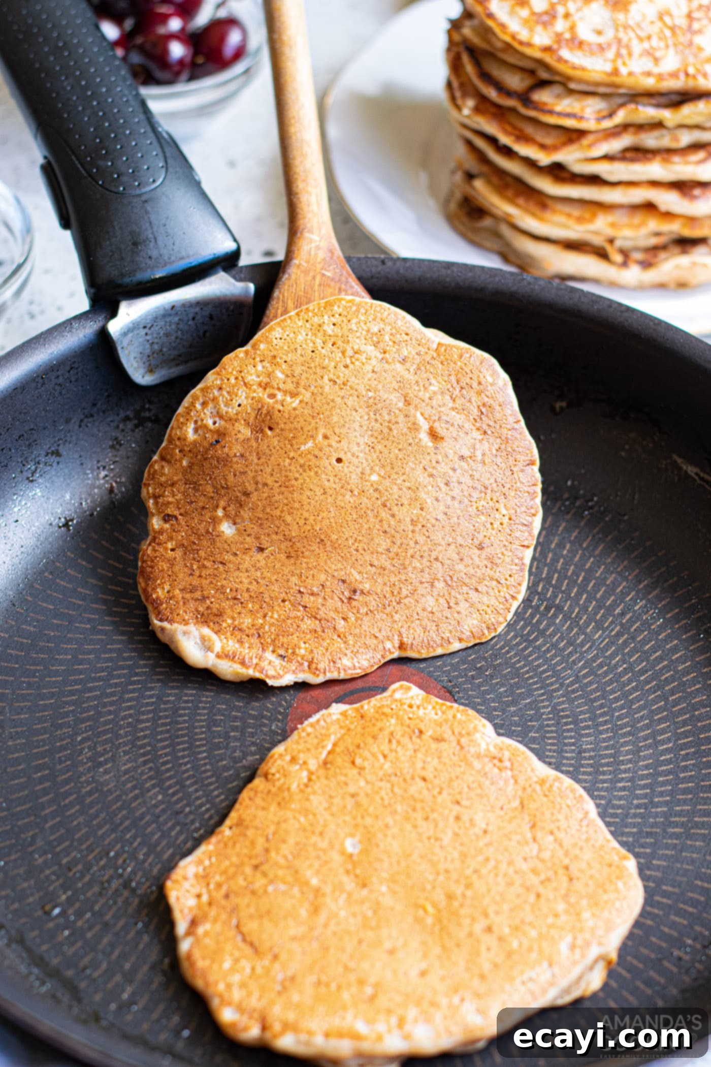 Morning Carrot Cake Bliss 7 pancakes on a skillet