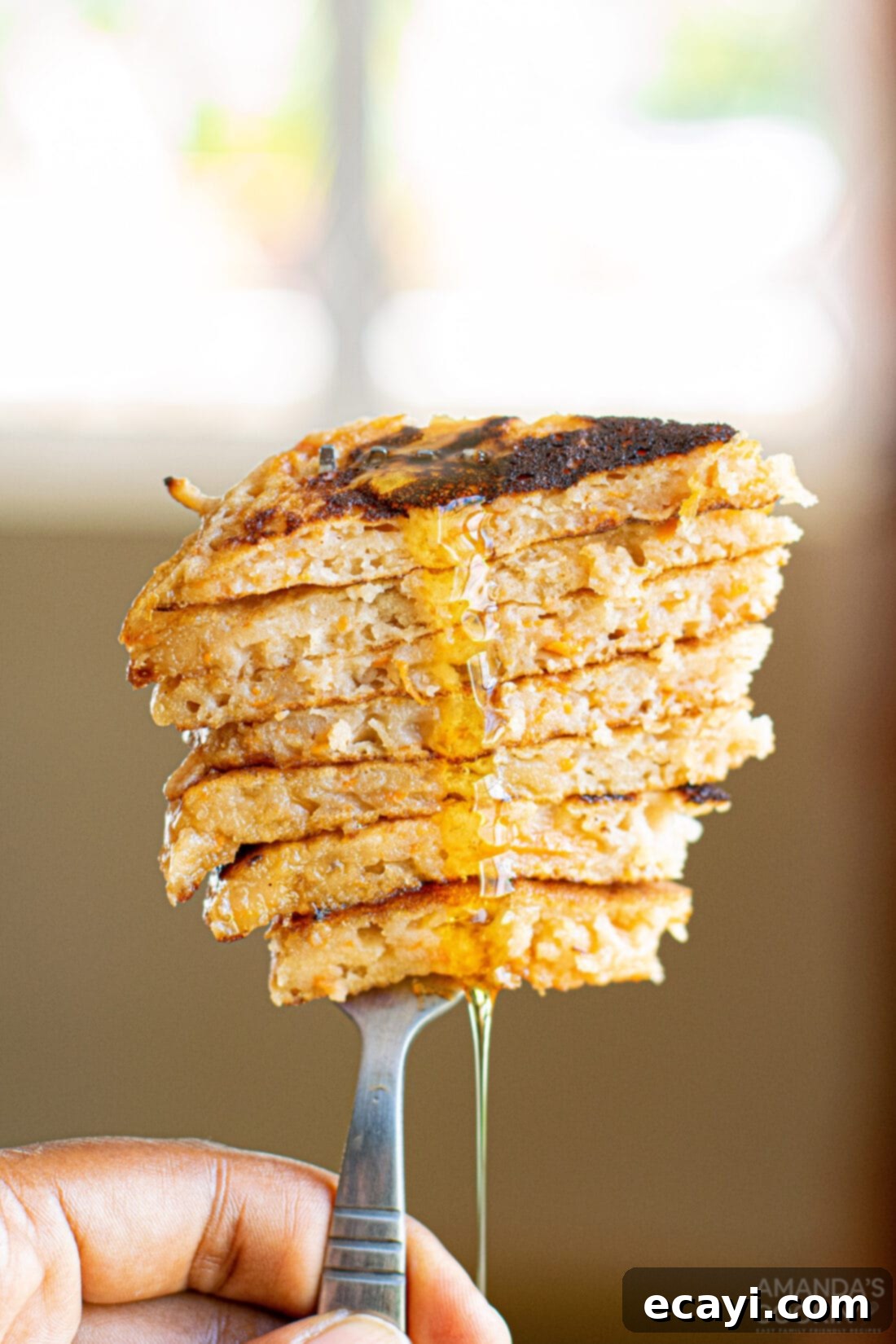 Morning Carrot Cake Bliss 8 sliced carrot cake pancakes on a fork