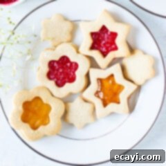 Linzer Jam Delights 11 linzer cookies on a plate