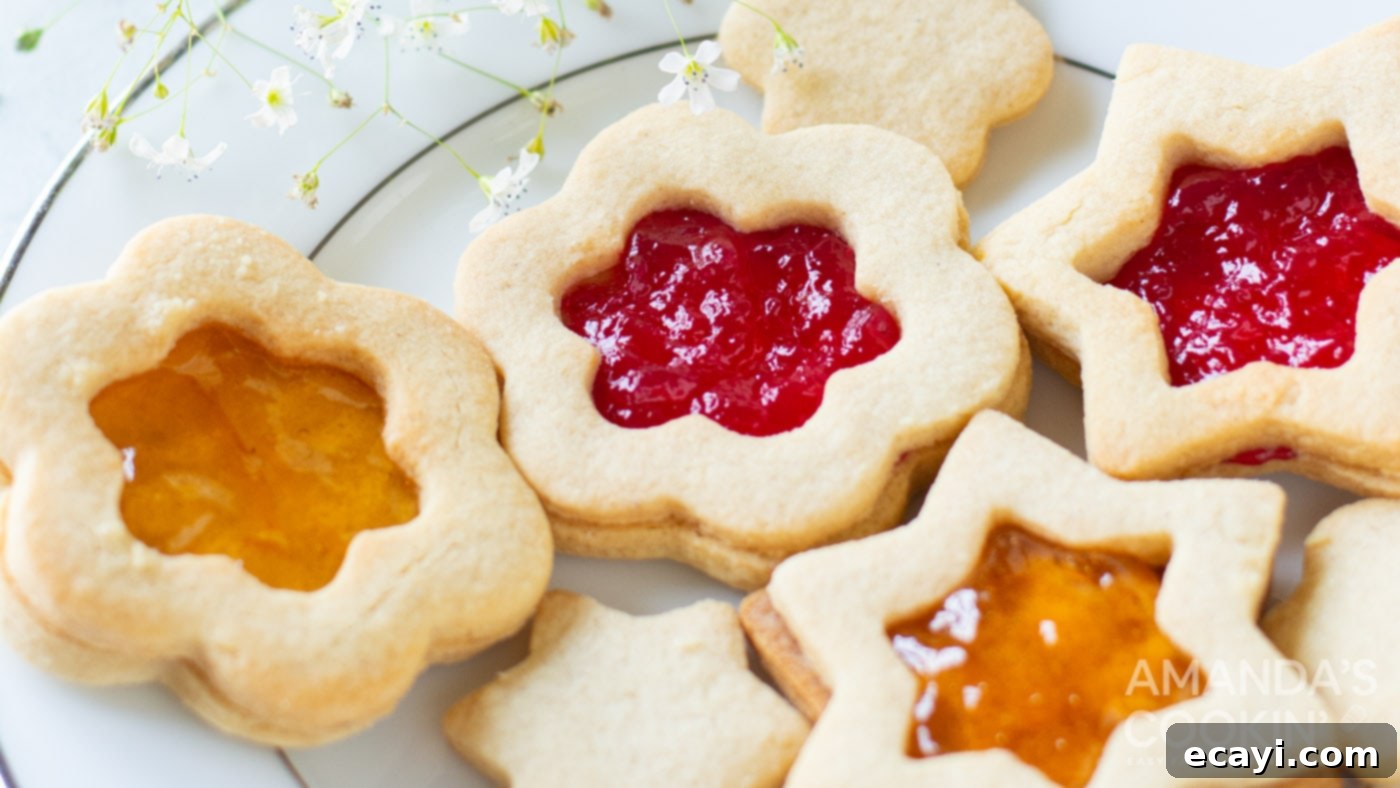 Linzer Jam Delights 9 linzer cookies on a plate