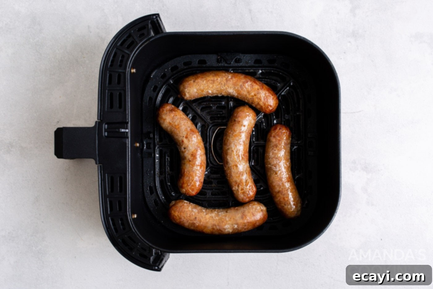 Crispy Air Fryer Bratwurst 6 cooked bratwurst in an air fryer