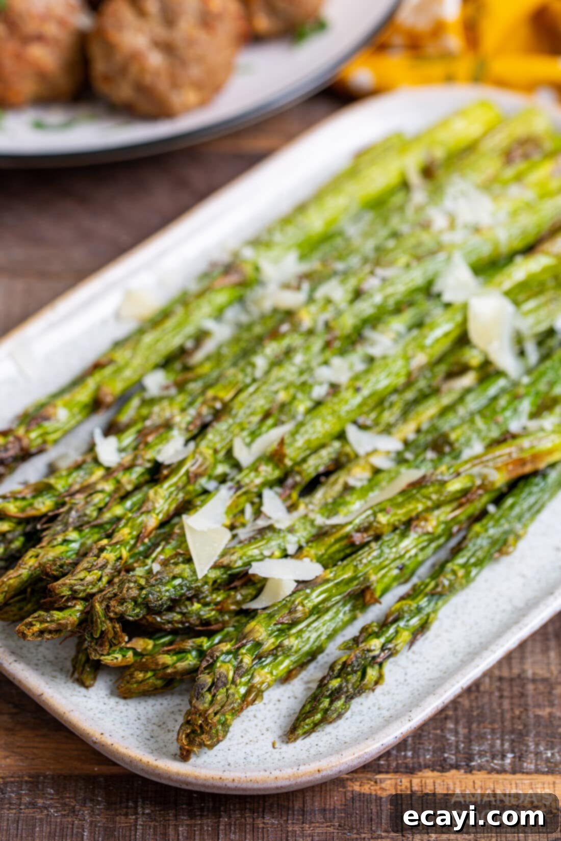 Crispy Air-Fried Asparagus 2 perfectly cooked asparagus spears on a plate, ready to serve