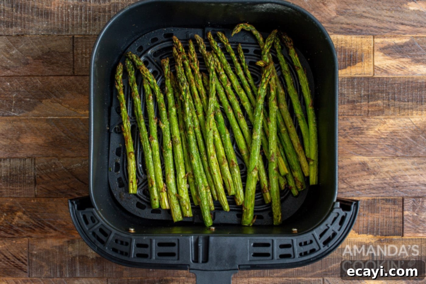 Crispy Air-Fried Asparagus 7 cooked asparagus in the air fryer, showing perfectly roasted spears