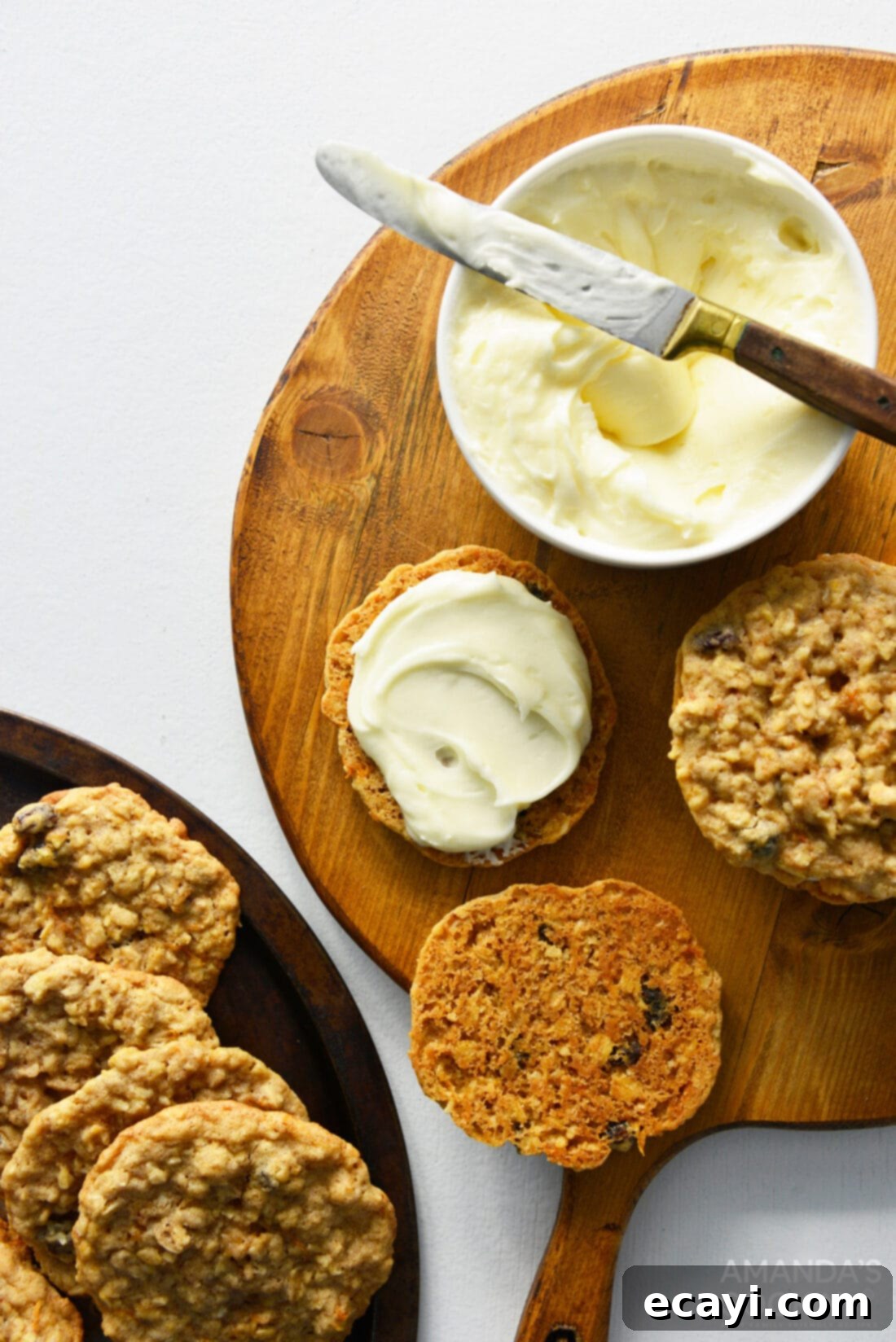 Decadent Carrot Cake Cookie Sandwiches 3 spreading frosting on a cookie