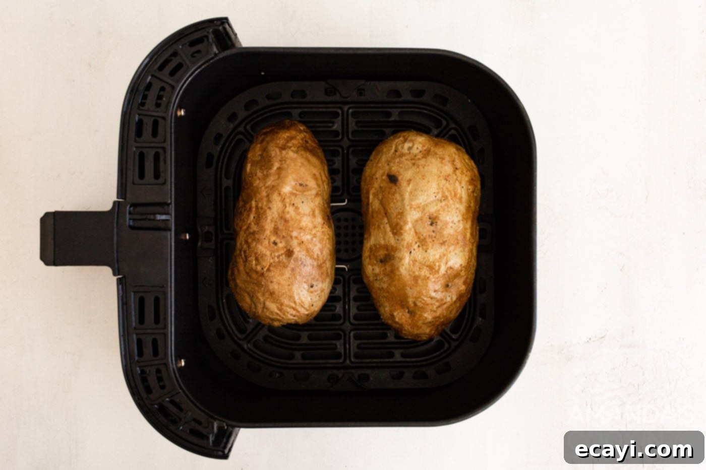 Perfect Air Fryer Baked Potatoes 6 cooked russet potatoes in air fryer basket