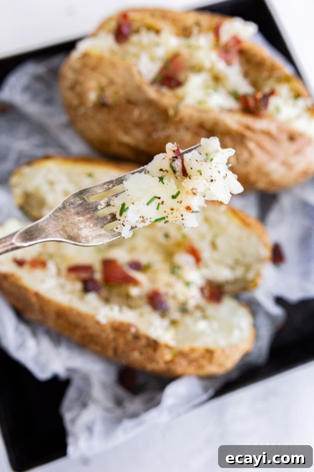 Perfect Air Fryer Baked Potatoes 7 fork full of air fryer baked potato
