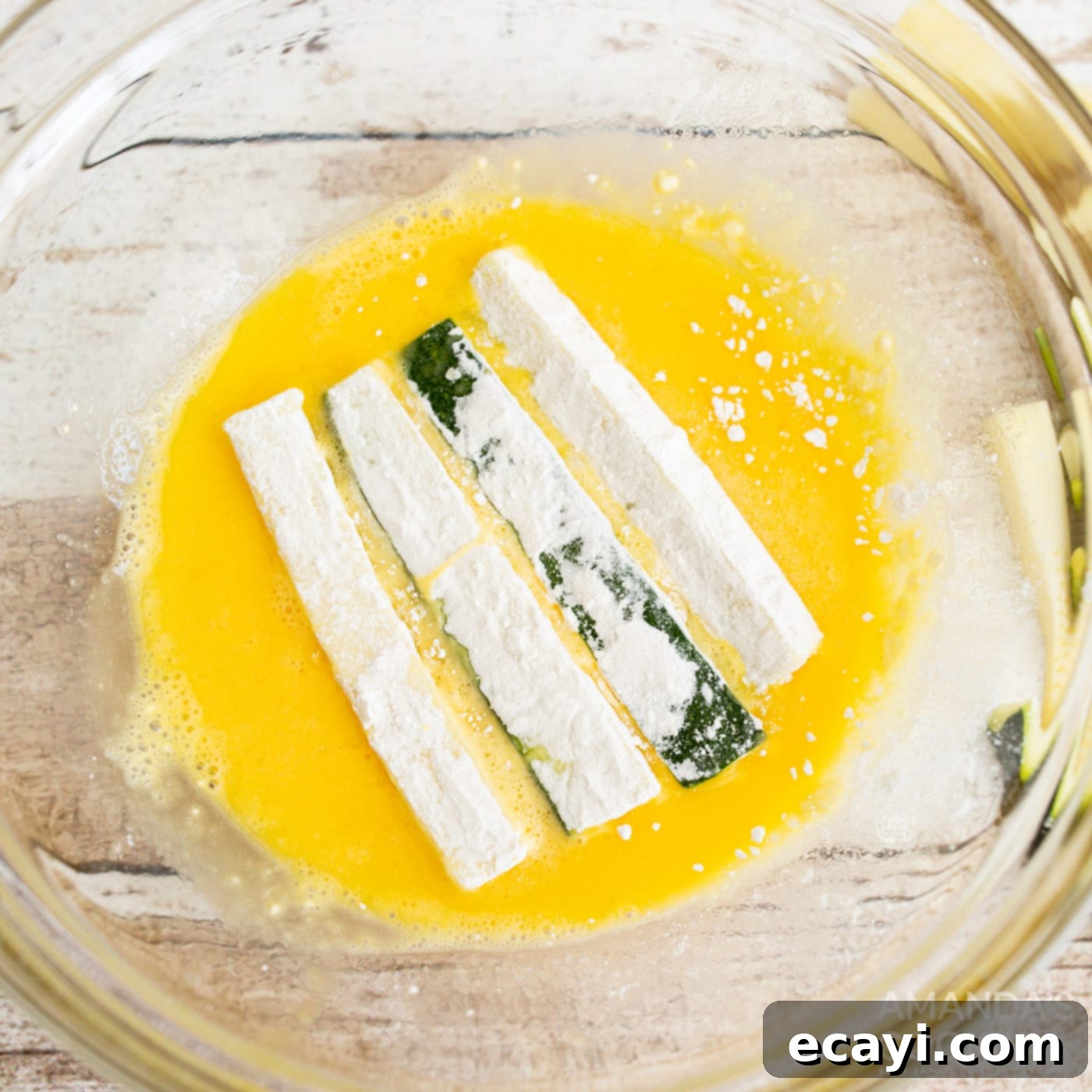 Crispy Air-Fried Zucchini Sticks 6 dredging flour zucchini sticks in eggwash