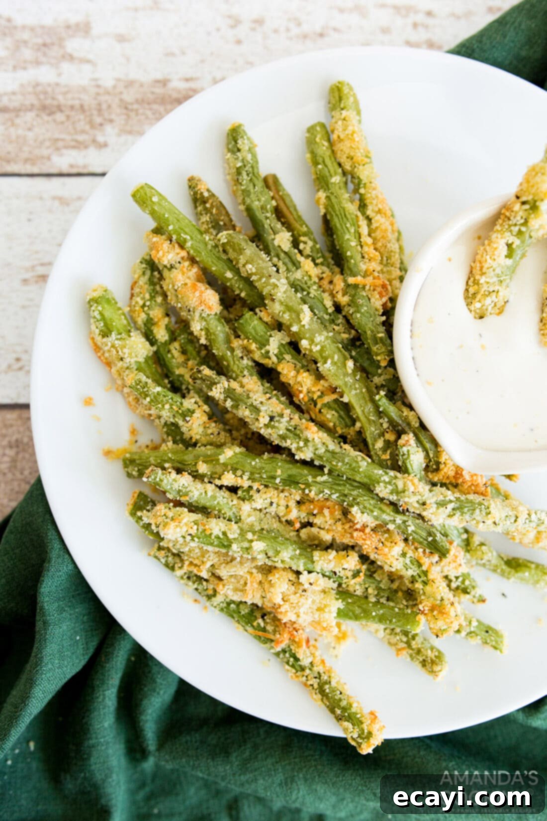 Crispy Air-Fried Green Bean Sticks 2 Air Fryer Green Bean Fries on a plate with dip