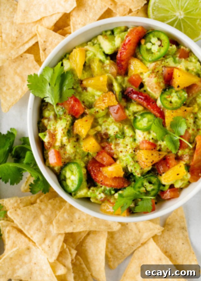 Zesty Chunky Guacamole 3 Close-up of Chunky Citrus Guacamole, showing vibrant colors and fresh ingredients.