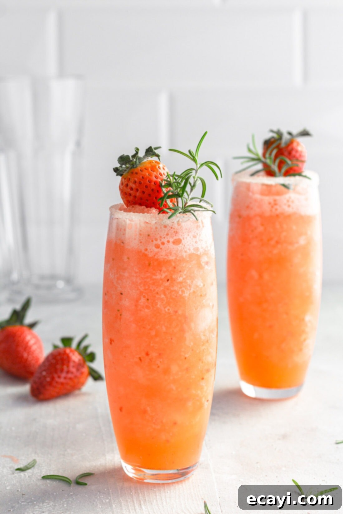 Strawberry Salty Freeze 3 Two glasses of Frozen Strawberry Salty Dog Cocktails garnished with strawberries
