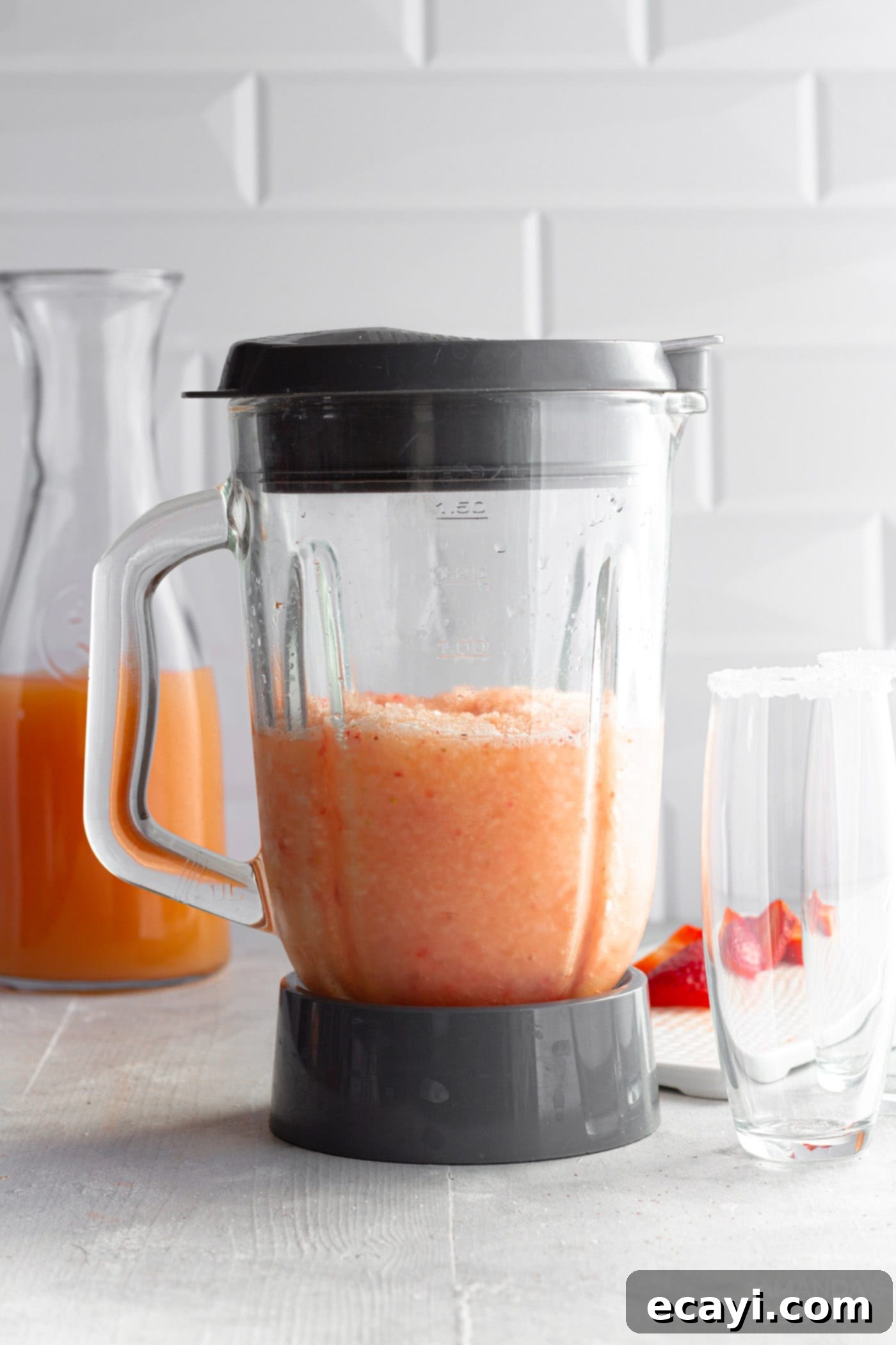 Strawberry Salty Freeze 7 Frozen strawberry salty dogs being blended to a smooth, slushy consistency