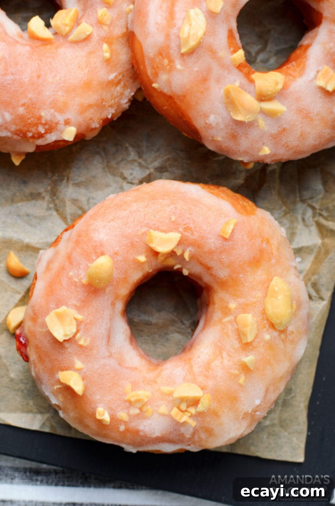 Peanut Butter and Jelly Donut Perfection 14 Overhead view of a single glazed and filled peanut butter and jelly donut