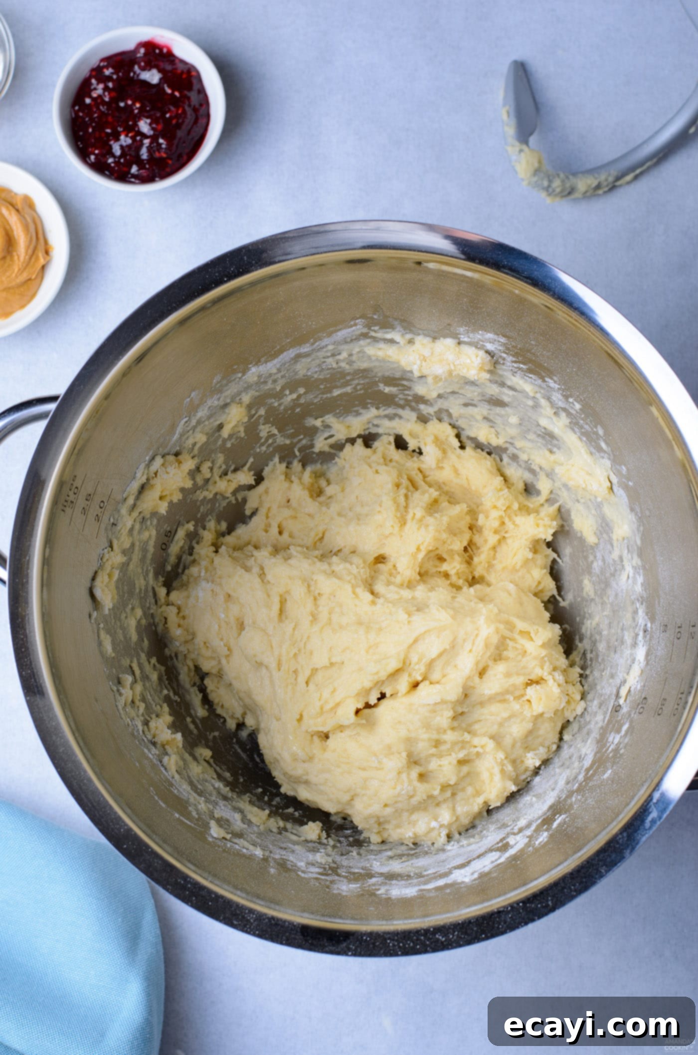 Peanut Butter and Jelly Donut Perfection 6 Smooth and elastic donut dough in a mixing bowl after kneading