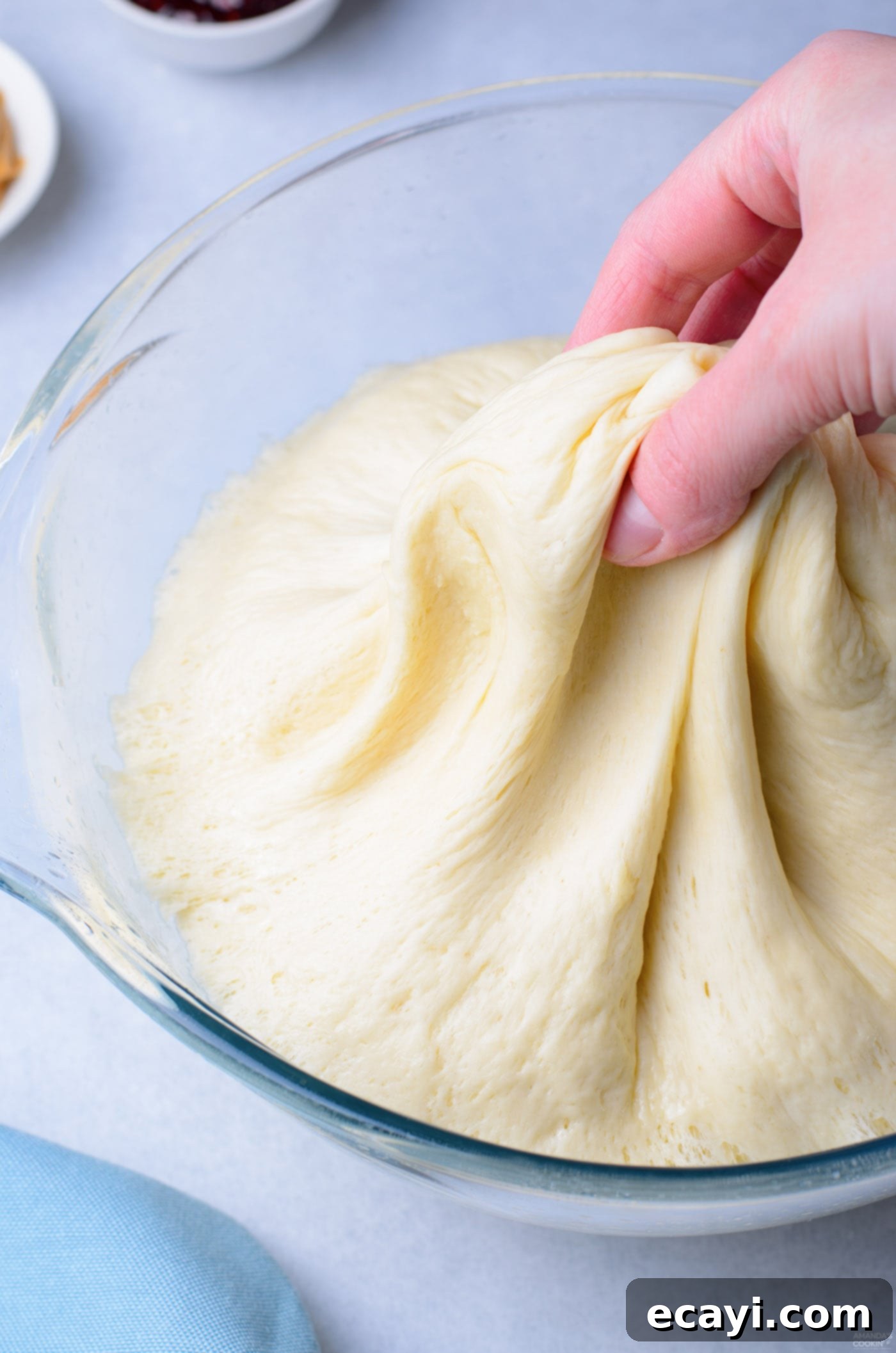Peanut Butter and Jelly Donut Perfection 8 Pinching and shaping donut dough before rolling it out