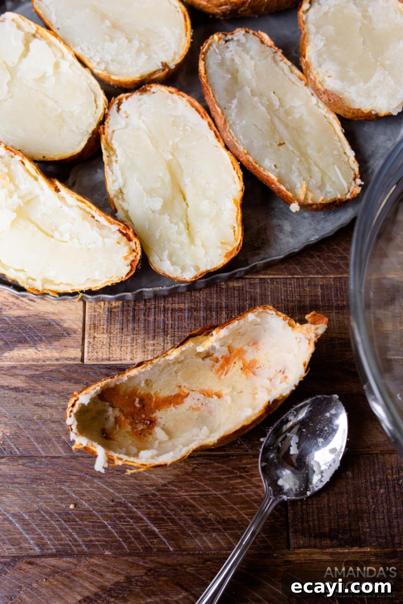 Golden Crispy Air Fryer Twice Baked Potatoes 7 Empty potato skins after scooping out the fluffy interior, ready to be filled