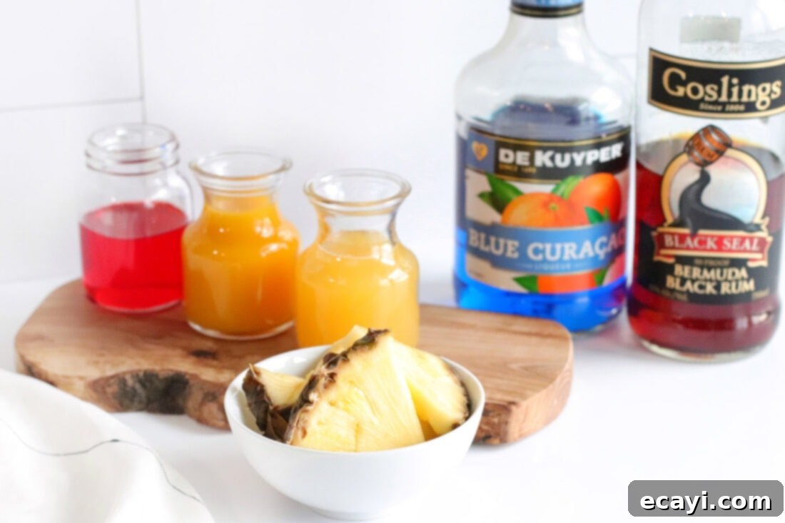 Azure Aloha Mai 4 A flat lay photograph showcasing all the ingredients required to prepare a delicious Blue Hawaiian Mai Tai cocktail: dark rum, blue curaçao, pineapple juice, mango juice, grenadine, and ice.