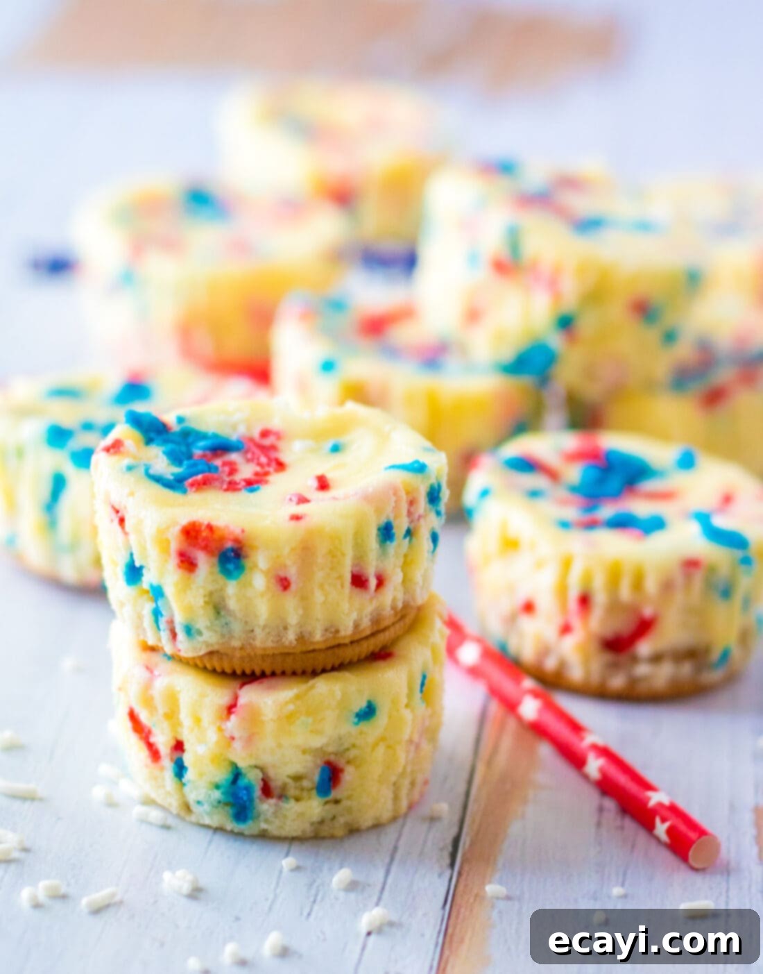 Stars and Stripes Cheesecake Bites 8 A beautiful arrangement of Patriotic Mini Cheesecakes, with some stacked and others ready to be enjoyed.