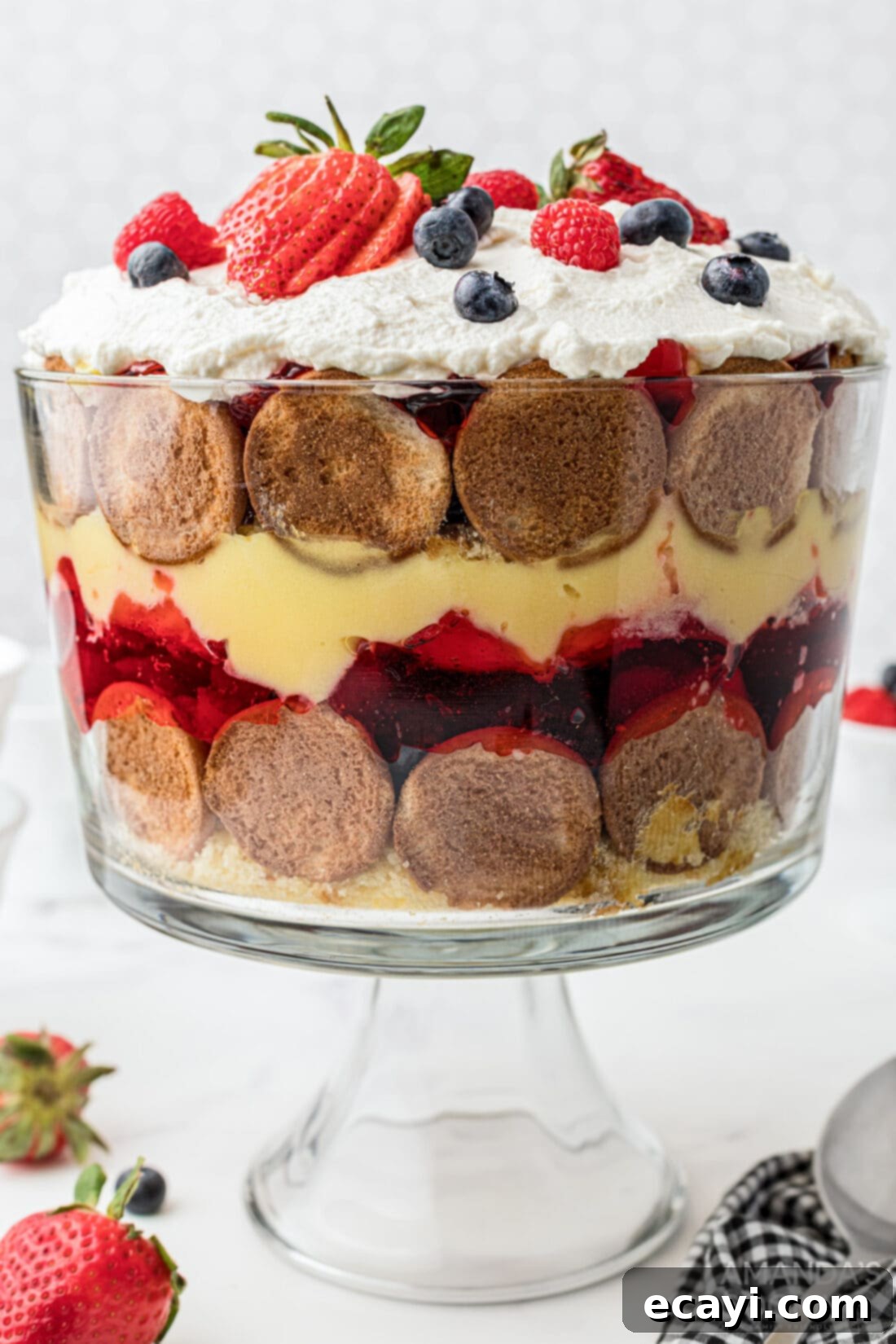 Whimsical Jelly Parfait 2 trifle made with jello with distinct layers of cake, pudding, jello, and fresh fruit