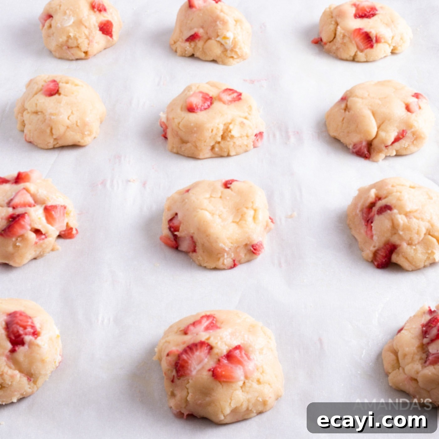 Zesty Strawberry Lemonade Cookies 14 Forming the filled cookie dough into smooth, round balls before baking.