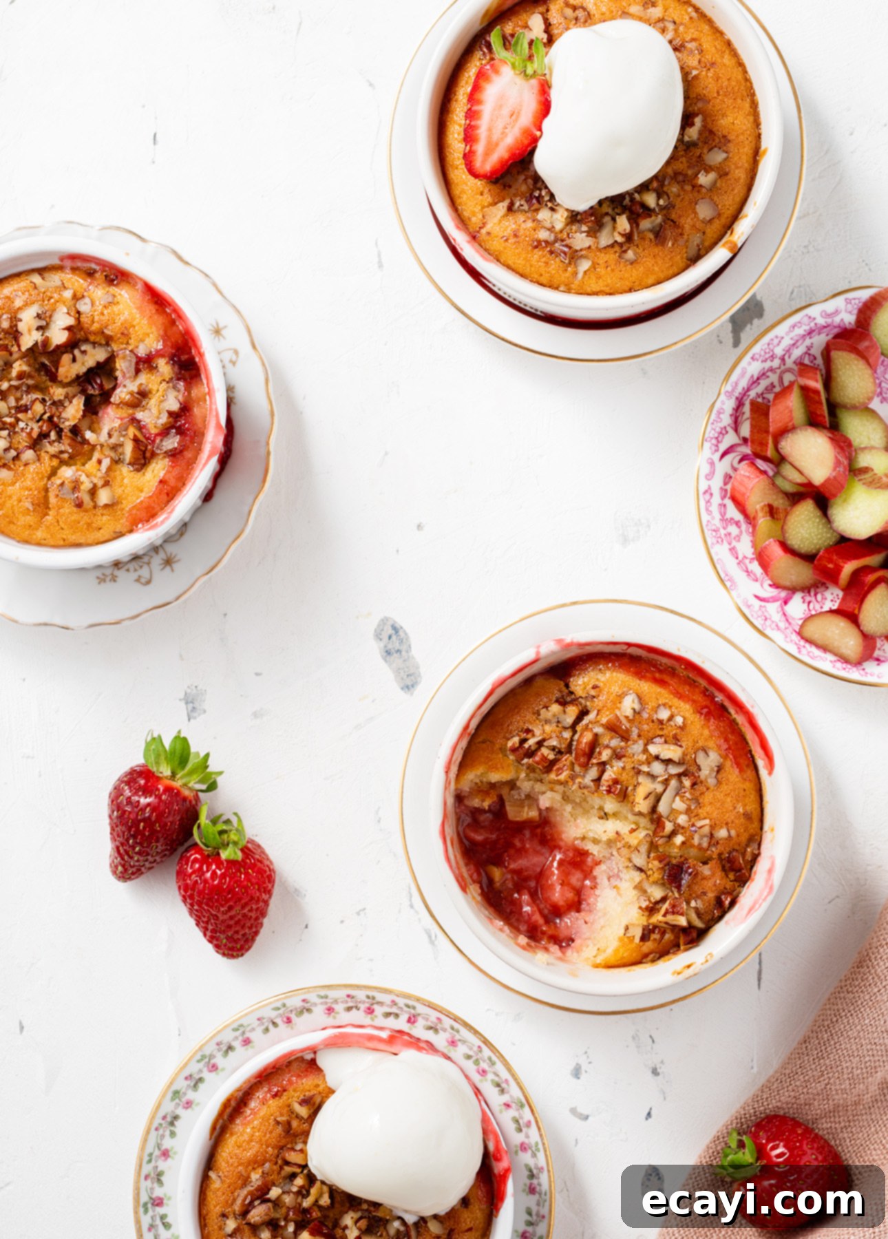 Luscious Strawberry Rhubarb Pudding Cakes 4 Strawberry Rhubarb Pudding Cakes // FoodNouveau.com
