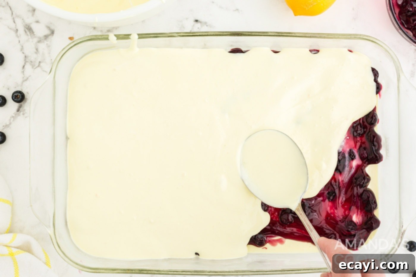 Zesty Lemon Blueberry Cloud Cake 9 Adding another layer of creamy lemon pudding on top of the blueberry pie filling.