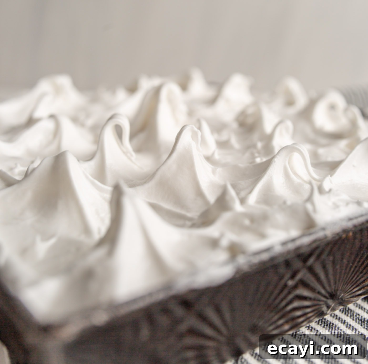 Tangy Lemon Meringue Pie Bars 11 Close-up of lemon meringue pie peaks before baking