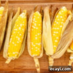 Golden Grilled Corn 11 corn on the cob with husks on