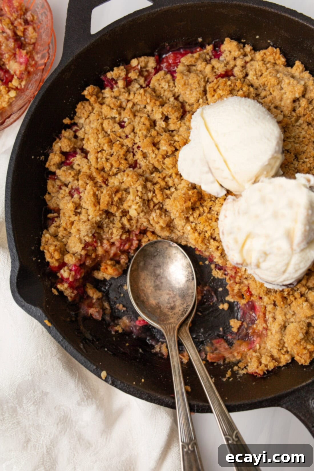 Sweet & Tart Rhubarb Crumble 3 rhubarb crisp in a cast iron skillet