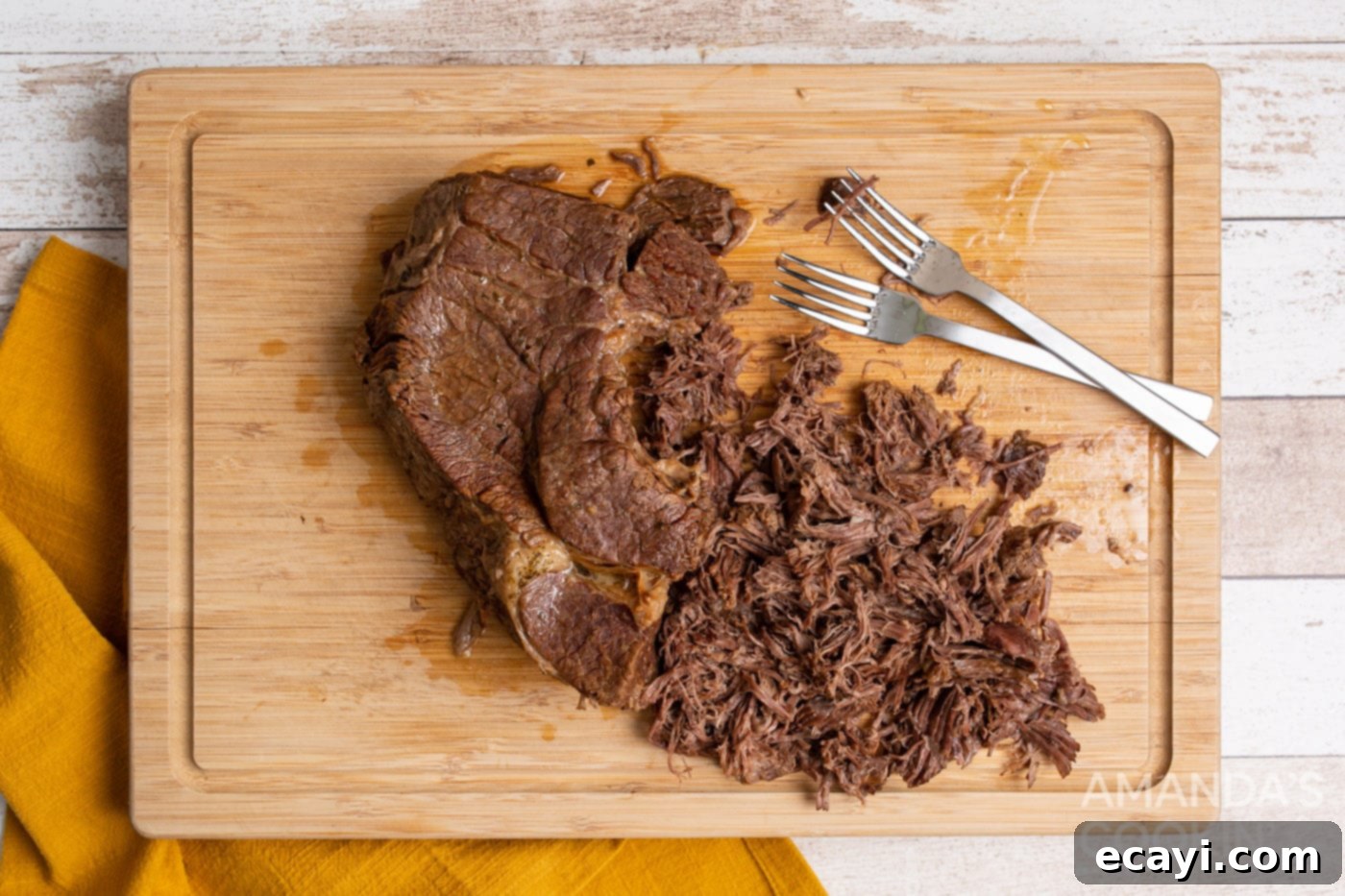 Effortless Southern Comfort Pot Roast 7 shredded chuck roast on cutting board