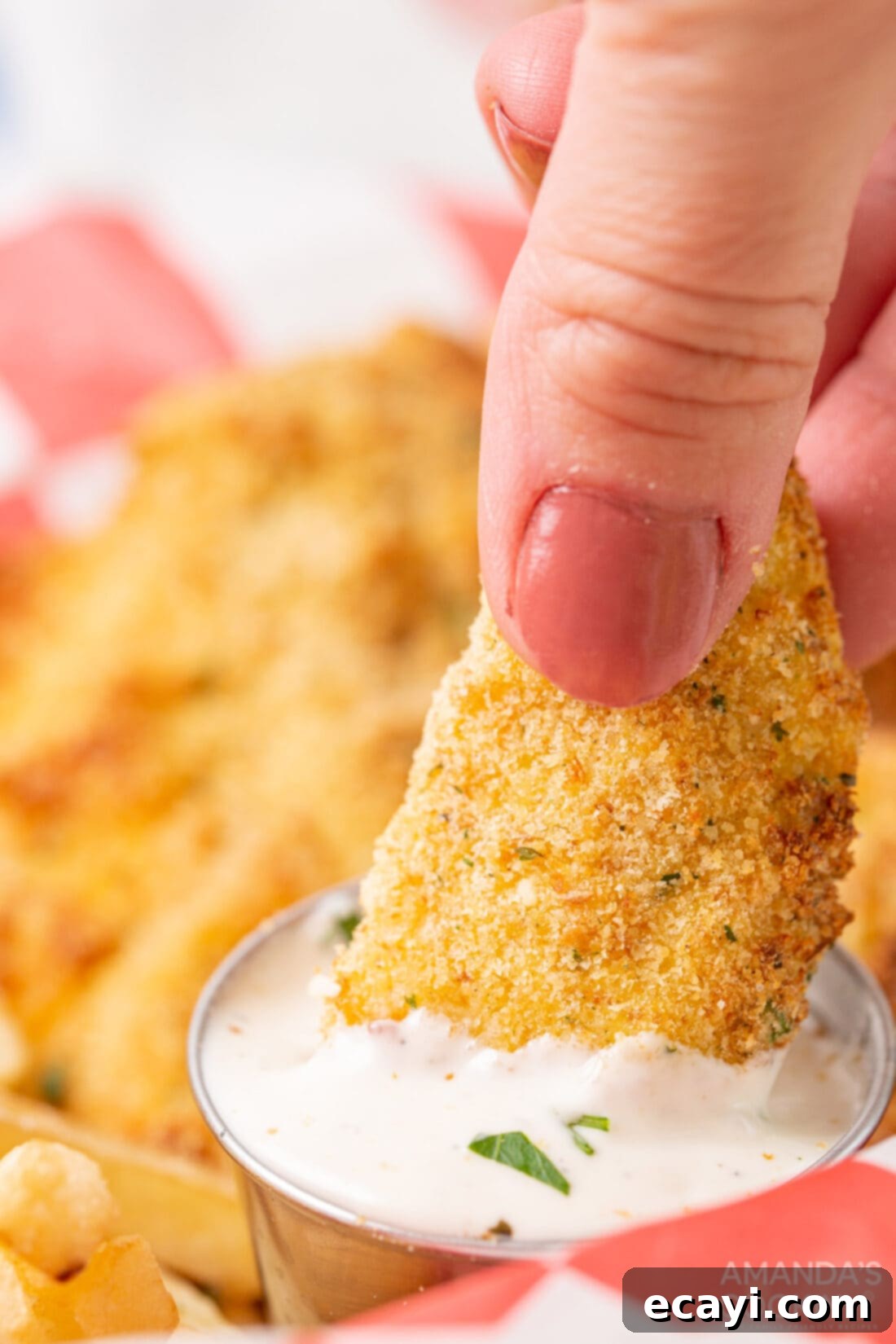 Crispy Air Fryer Chicken Tenders 8 dipping chicken tender in ranch