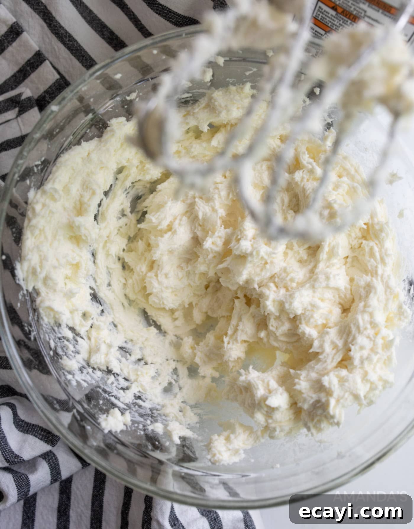 Silky Smooth Instant Pot Cheesecake 6 cream cheese, sugar, and flour mixed in bowl