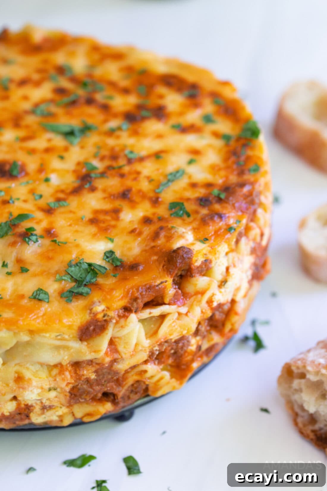 Quick Instant Pot Lasagna 3 A whole Instant Pot Lasagna in a springform pan, ready to be sliced and served.