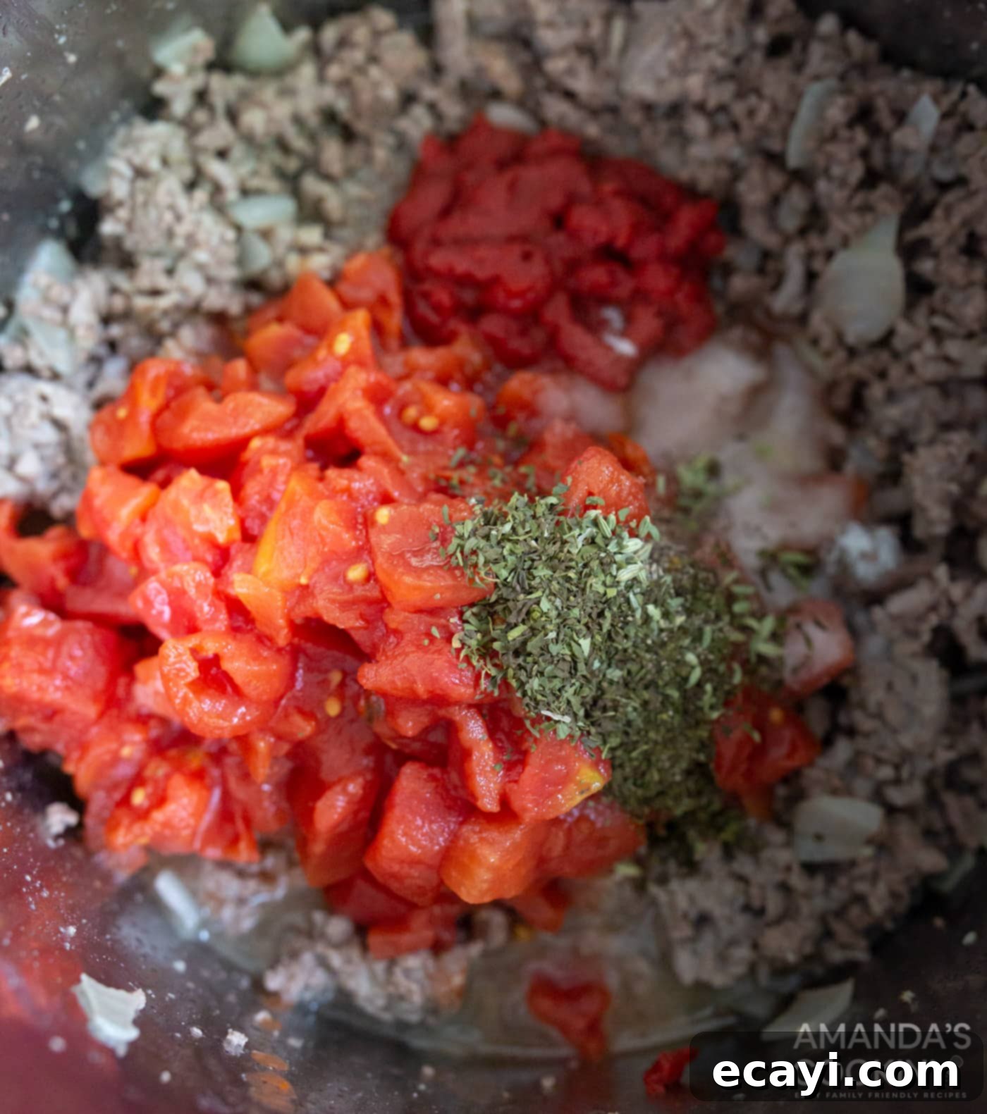 Quick Instant Pot Lasagna 5 Lasagna meat sauce ingredients simmering in the Instant Pot