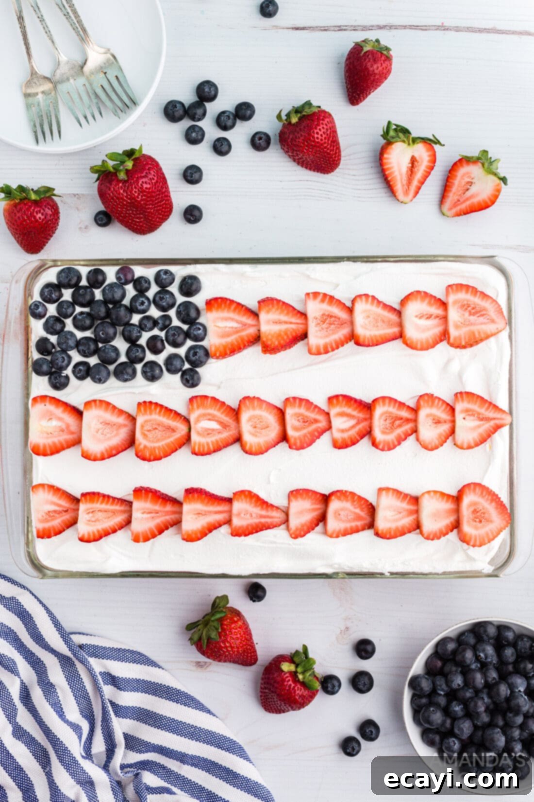 Patriotic Red, White and Blue Poke Cake 2 Vibrant American flag decorated poke cake, perfect for patriotic celebrations.